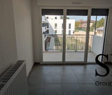 T2 AVEC TERRASSE ET UN PARKING COUVERT - Photo 4