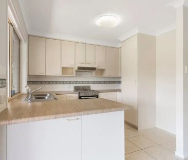 “PEACEFUL LIVING IN GATED COMPLEX | LAWN MAINTENANCE INCL.” - Photo 1