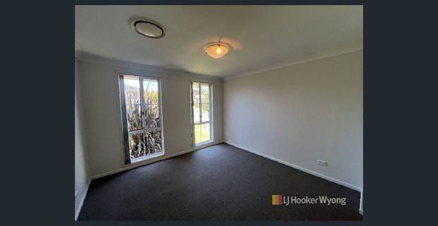 Spacious 4-Bedroom Family Home in Prime Location - Photo 1