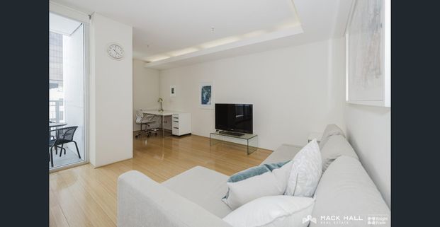 Fully furnished contemporary Living at Condor Towers - Photo 1