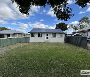 Long-Term 2-Bedroom Rental with Secure Fenced Yard - Photo 2