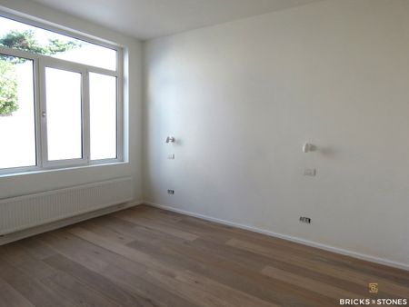 Gelijkvloers appartement met tuin en garage - Photo 5