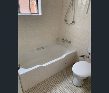 Spacious & Well-Maintained 2-Bedroom Unit in a Convenient Location - Photo 4