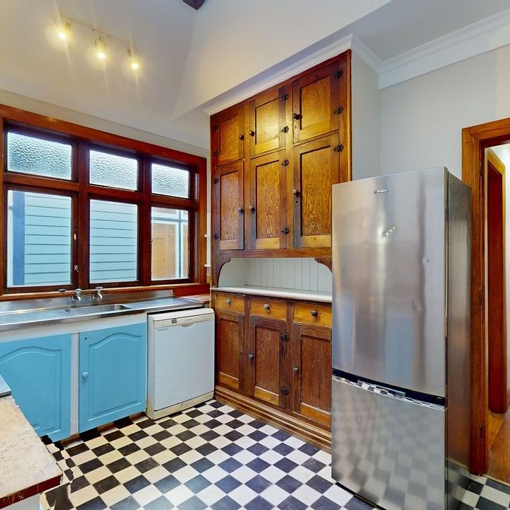 CENTRALLY LOCATED 4 BEDROOM HOME - Photo 1