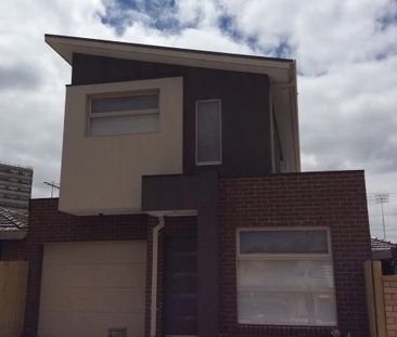 Register to Inspect // Stylish Two-Bedroom Townhouse with Dual Livi... - Photo 6