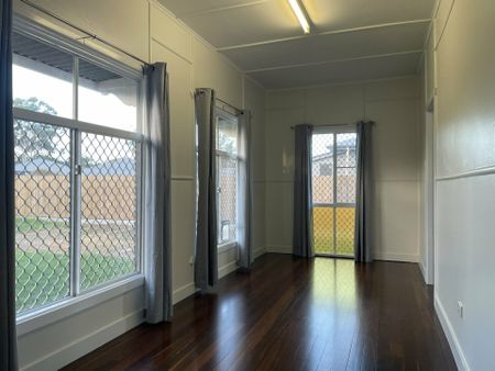 Spacious 3-Bedroom Home with sunroom, Close to School - Photo 4