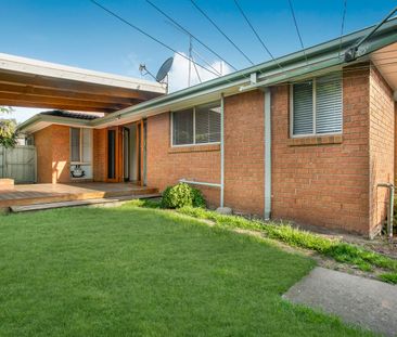 EXCITING LOCATION, EXCELLENT HOME - Photo 1