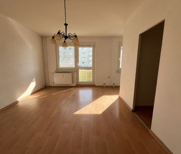 Kompakte Wohnung mit sonnigem Balkon - Foto 1