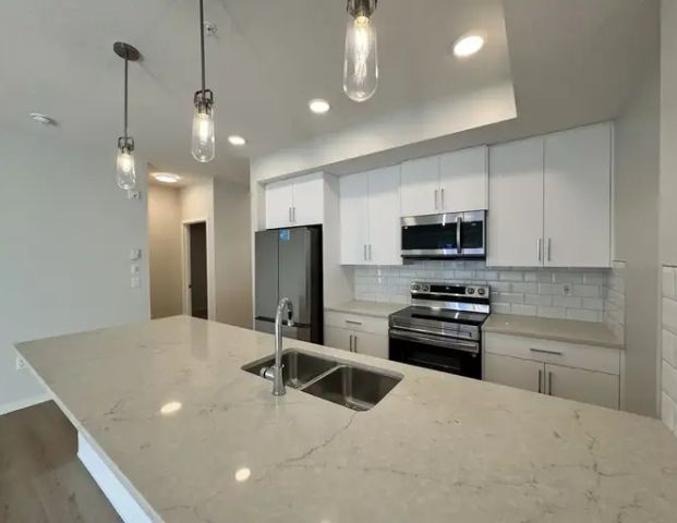 50% DAMAGE DEPOSIT INCENTIVE - BEAUTIFUL BRAND NEW UNIT - 3RD FLOOR | 20295 Seton Way Southeast, Calgary - Photo 1