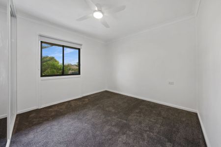 Freshly Renovated Coastal Home - Lawn Maintenance Included - Photo 3