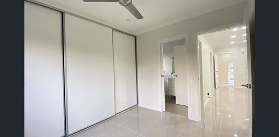 Spacious & Private 2-Bedroom Home in a Central Location - Photo 2