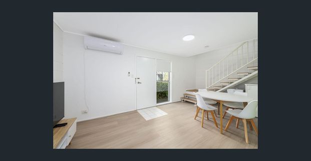 TIDY UNIT STEPS FROM THE BEACH` - Photo 1