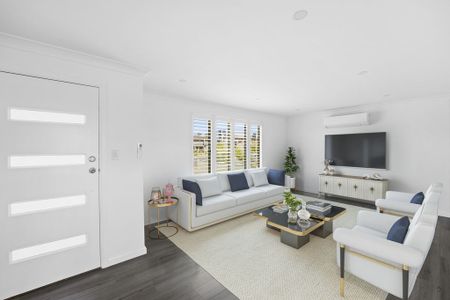 Modern Comfort Meets Entertainer's Delight: Stylish 3-Bedroom - Photo 2