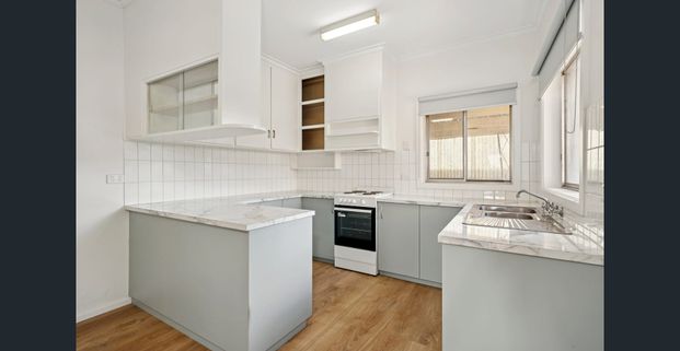 Renovated 3-Bedroom Home in a Prime Location - Photo 1