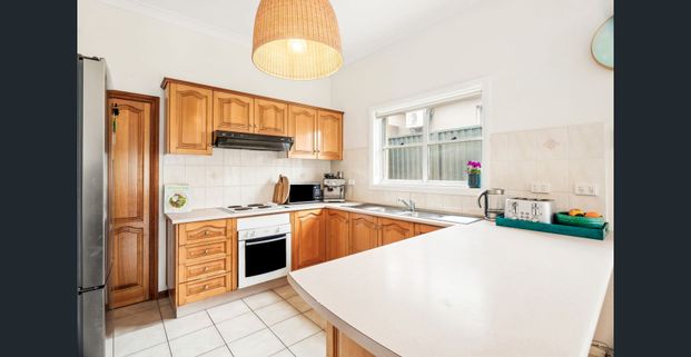 Freshly Painted, Light-Filled Two-Bedroom Home in Sought-After Area - Photo 1