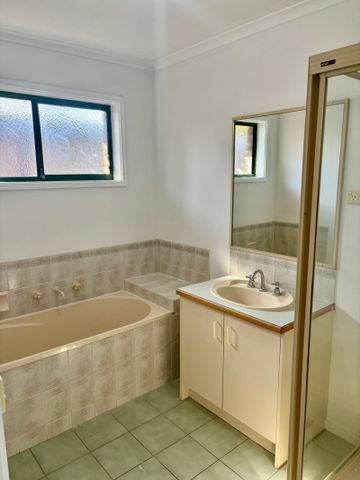 FOUR BEDROOM FAMILY HOME WITH SOLAR - Photo 5