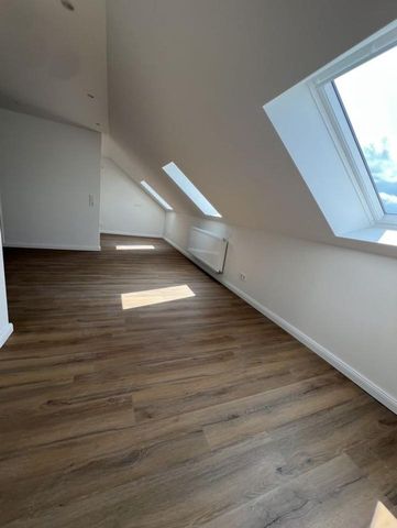 Erstbezug nach Sanierung: Charmante Dachgeschosswohnung - Foto 5