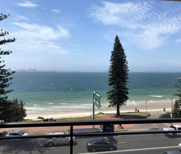 Sun-Drenched Beachside Living with Stunning Water Views - Photo 1