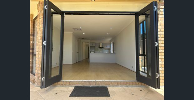 Experience modern living in this beautifully designed home, nestled in the peaceful and family-friendly suburb of Oakden - Photo 1