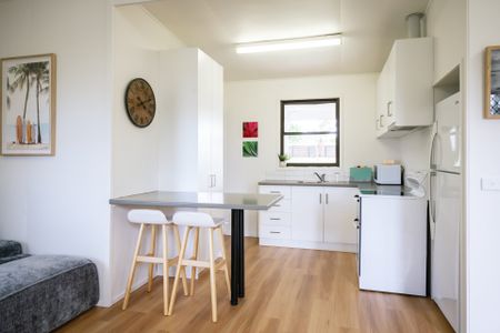 Coastal retreat steps from the shore! - Photo 4