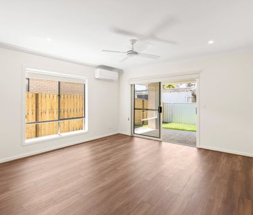 Modern Four-Bedroom Family Home with Separate Media Room - Photo 1