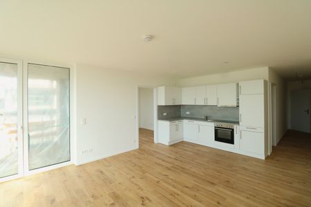 Traumhafte 4,5-Zimmer Neubauwohnung mit direktem Flussblick wartet auf Sie! - Photo 2