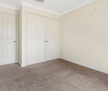 Spacious and Low-Maintenance Living in a Prime Location - Photo 1