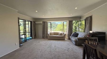 Modern Three-Bedroom Home with Sunroom and Stunning Views - Photo 2