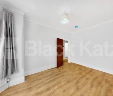 A beautifully renovated four bedroom house offering generous living... - Photo 6