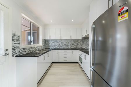 PRISTINE FOUR BEDROOM HOME - Photo 5