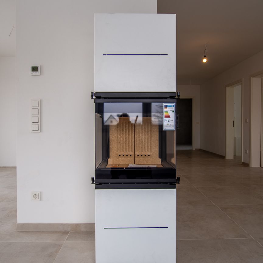 Ankommen & Wohlfühlen – Neubauwohnung mit Kamin und Balkon - Photo 1