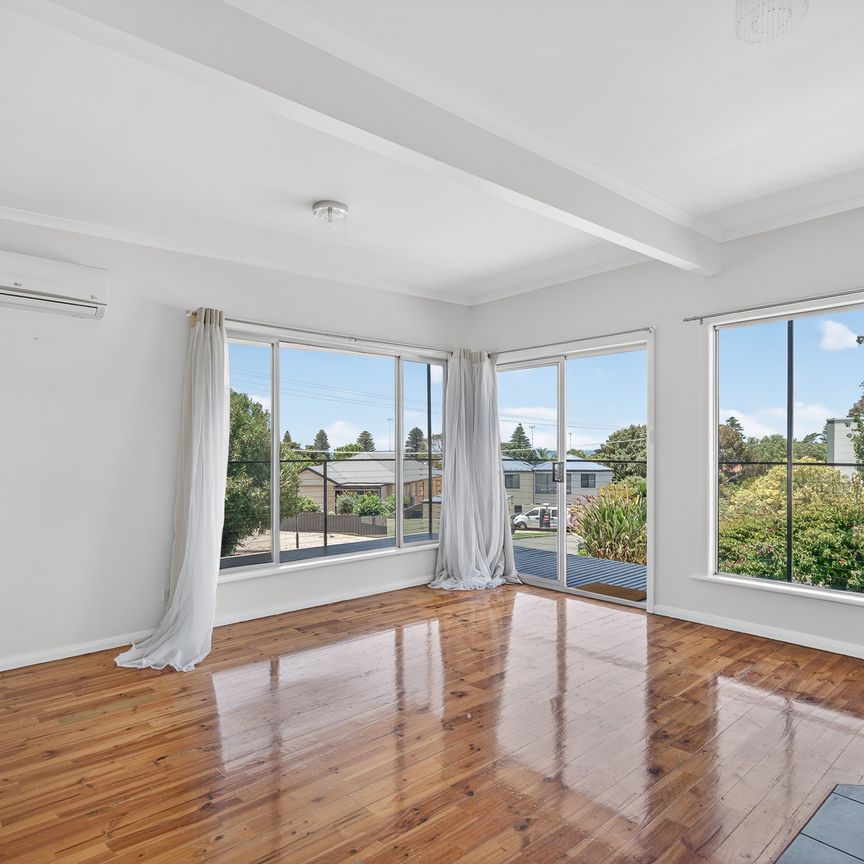 Open the Door to Elevated Coastal Living - Photo 1