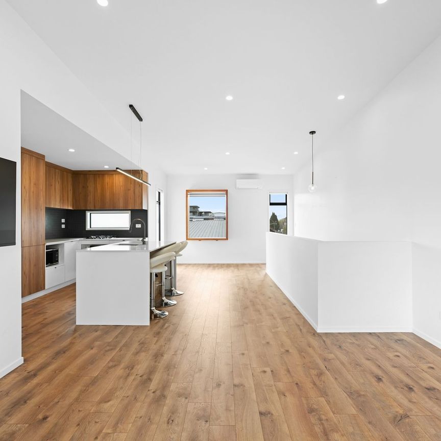 Discover the perfect blend of design, space, and location in this stunning three-bedroom, two-bathroom home over two levels on Victoria Street. - Photo 1