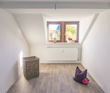 Wunderschöne Dachgeschosswohnung mit viel Platz zum Entfalten - Foto 4