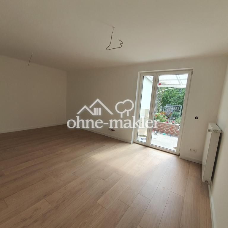 Traumhafte 3 Zimmer EG Wohnung mit Terasse + zwei Garagen zu vermieten - Foto 1