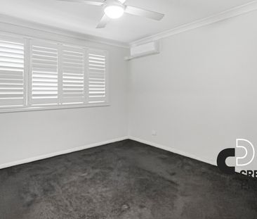 Family Home with Modern Comfort & Multiple Living Areas - Photo 3