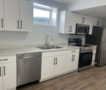 B - 138 Kostiuk Crescent, SaskatoonSuite | 2 Bedrooms | 1 Bathroom ... - Photo 3