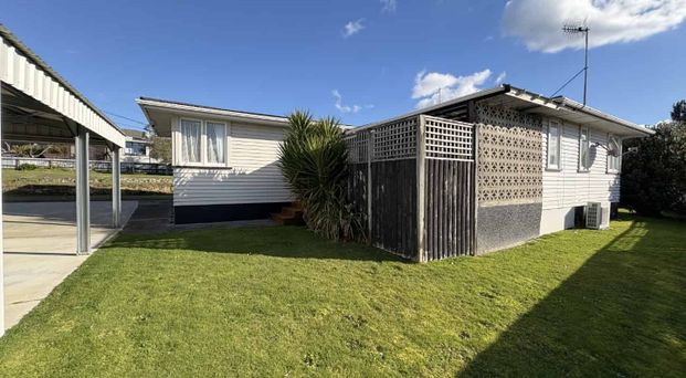 Tidy 3-Bedroom Home with Great Indoor-Outdoor Flow - Photo 1
