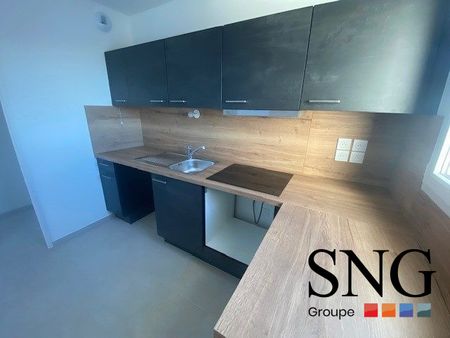 T4 AVEC LOGGIA + PARKINGS - Photo 4