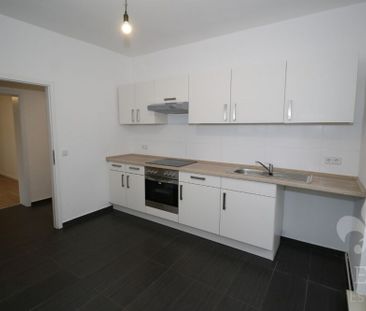 Ruhige 2 Raum-Single-Wohnung im Erdgeschoss mit Einbauküche, Balkon... - Photo 1