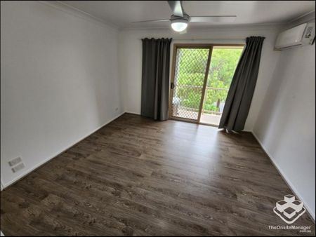 Double Garage, Air-Conditioned and wooden flooring throughout! - Photo 3