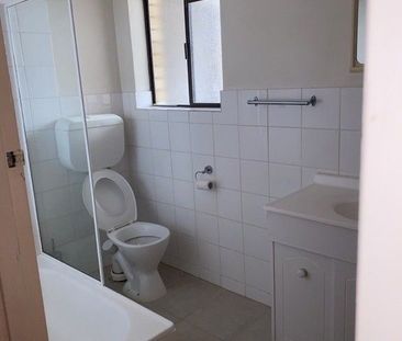 Two Bedroom Unit - Coastal Convenience with Everyday Comfort - Photo 3