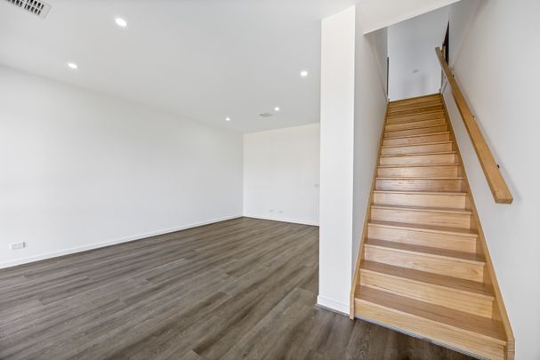 BRAND NEW THREE BEDROOM TOWNHOUSE IN PRIME LOCATION - Photo 1