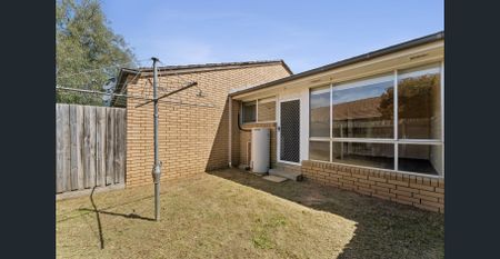 Tidy Two-Bedroom Unit in the Heart of Town - Photo 5