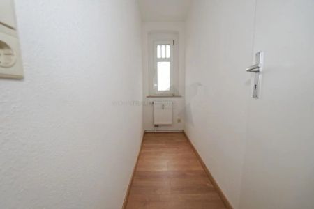 Charmante Dachgeschosswohnung mit moderner Ausstattung und Garten - Photo 2