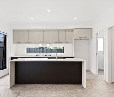 Spacious 4-Bedroom Home with Modern Features in Wollert - Photo 3