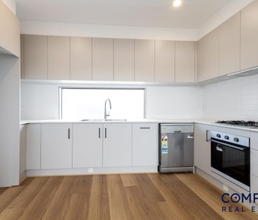 Brand New Tri-Level Townhouse - Photo 2