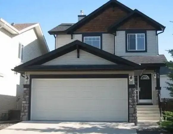 Lovely 3 Bed, 3.5 Bath House | 58 Cougarstone Circle SW, Calgary - Photo 1