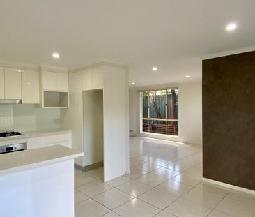 Immaculate Semi-House with Great Privacy at the Rear of A Block Clo... - Photo 1