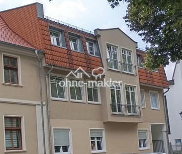 Helle 2,5-Zimmer-Wohnung mit Einbauküche in gepflegtem 5-Parteienha... - Foto 1